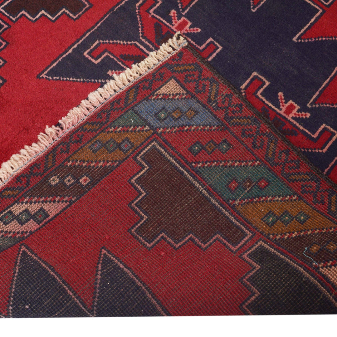 Red Afghan Baluchi Rug 2' 11" x 4' 4" Hand-Knotted close-up