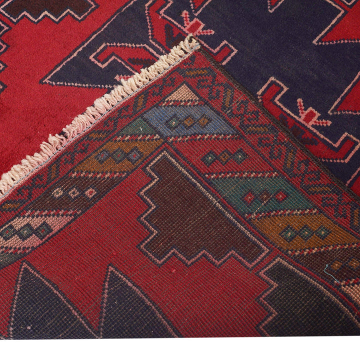 Red Afghan Baluchi Rug 2' 11" x 4' 4" Hand-Knotted close-up
