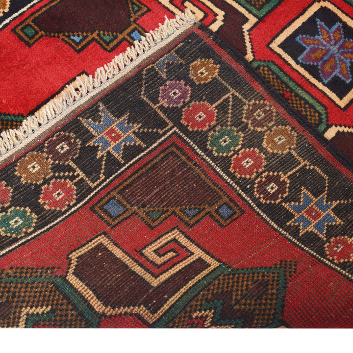 Red Afghan Baluchi Rug 2' 7" x 4' 3" Hand-Knotted close-up