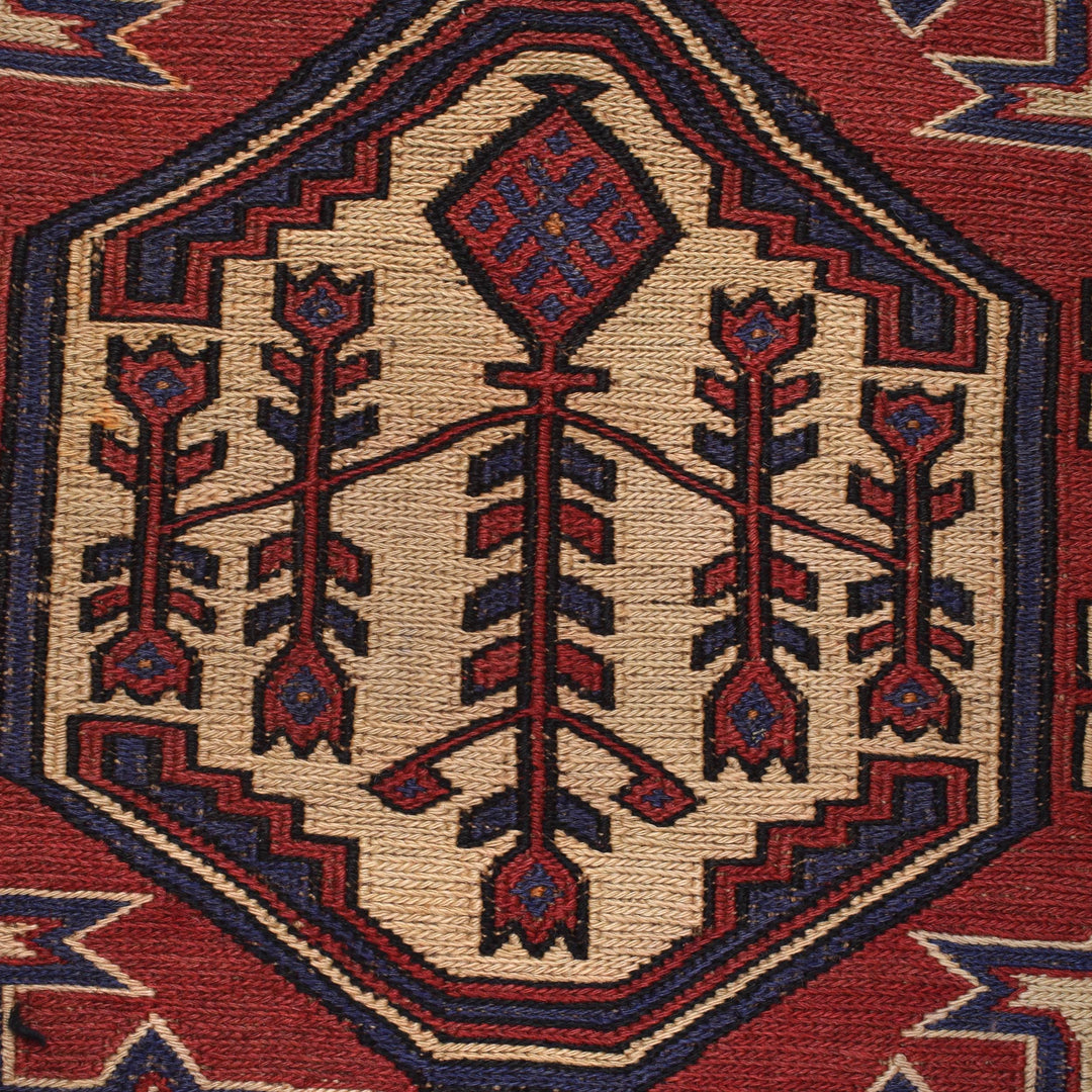 Beige Afghan Saghari Rug 4' 7" x 6' 5" Flat-Weave close-up