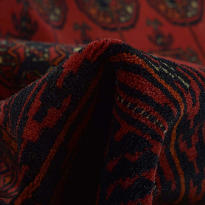 Red Afghan Bokhara Rug 7' 0" x 9' 5" Hand-Knotted | No. AL12257