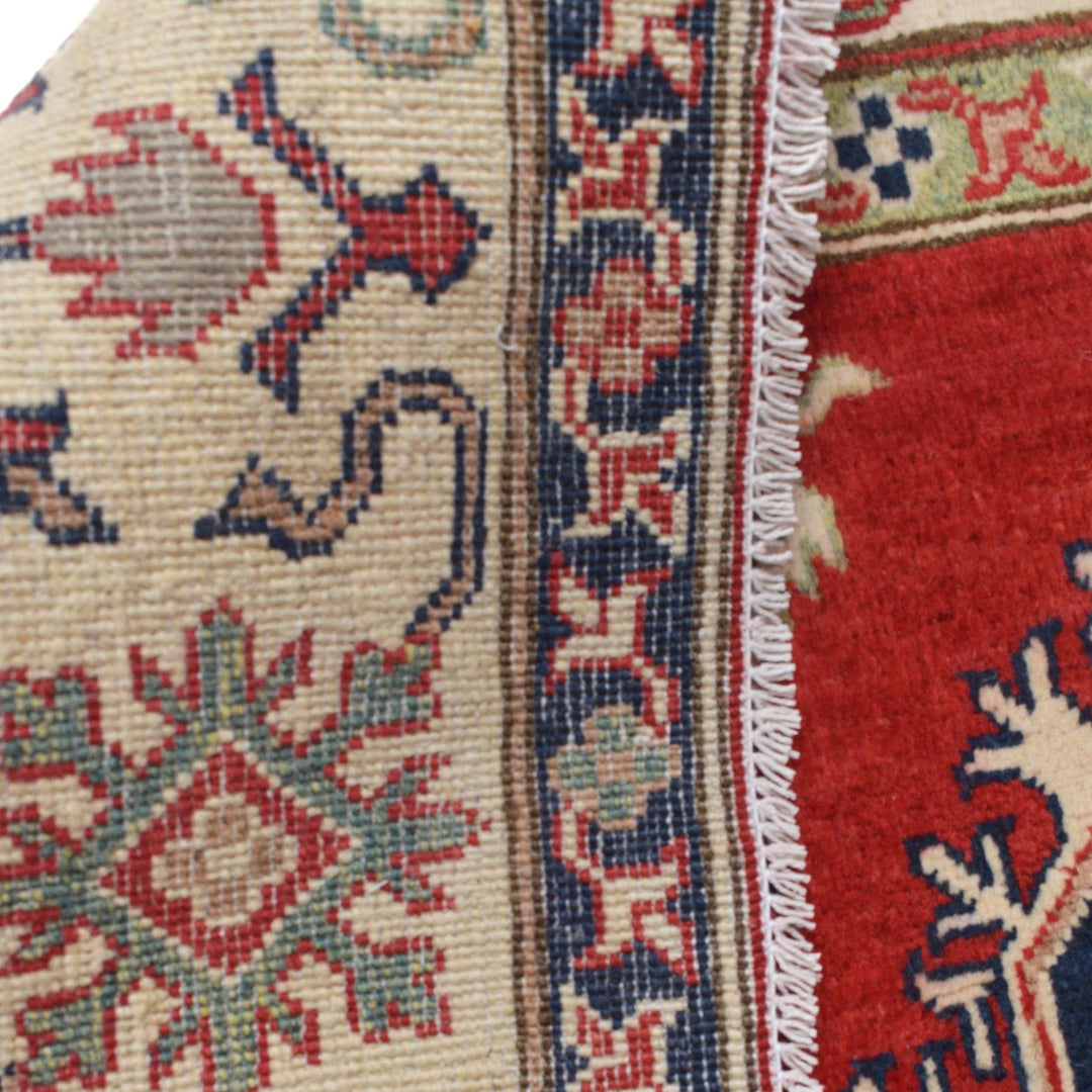 Red Afghan Kazak Rug 4' 11" x 6' 7" Hand-Knotted | No. AL36593