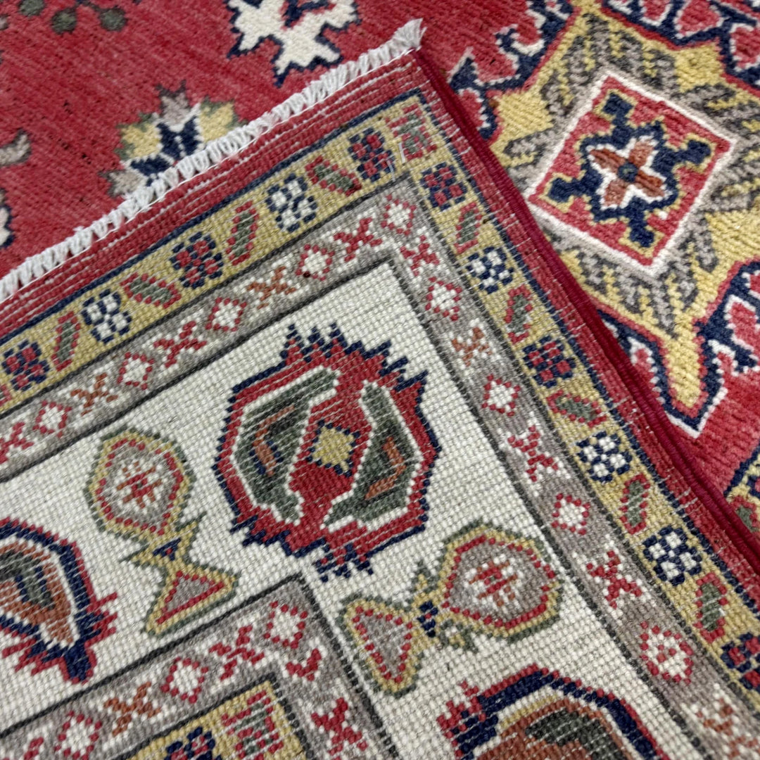 Red Afghan Kazak Rug 4' 11" x 6' 4" Hand-Knotted | No. AL39715