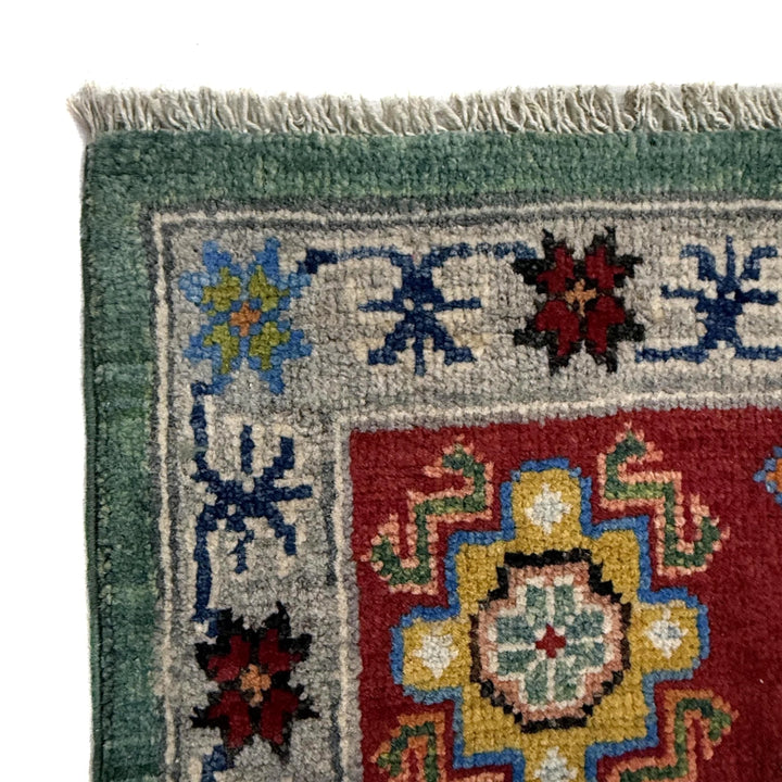 Green Afghan Kazak Rug 6' 9" x 10' 0" Hand-Knotted | No. AL46764