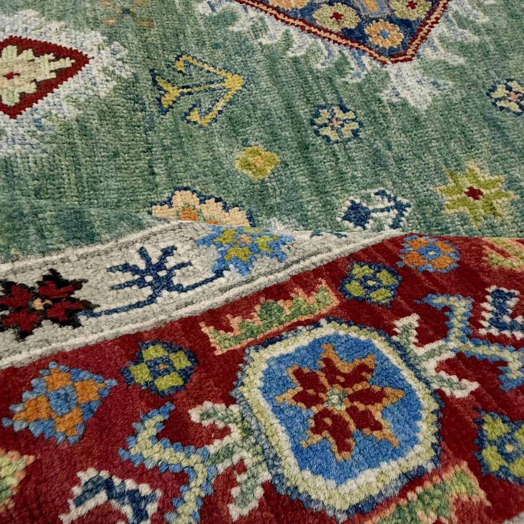 Green Afghan Kazak Rug 6' 9" x 10' 0" Hand-Knotted | No. AL46764