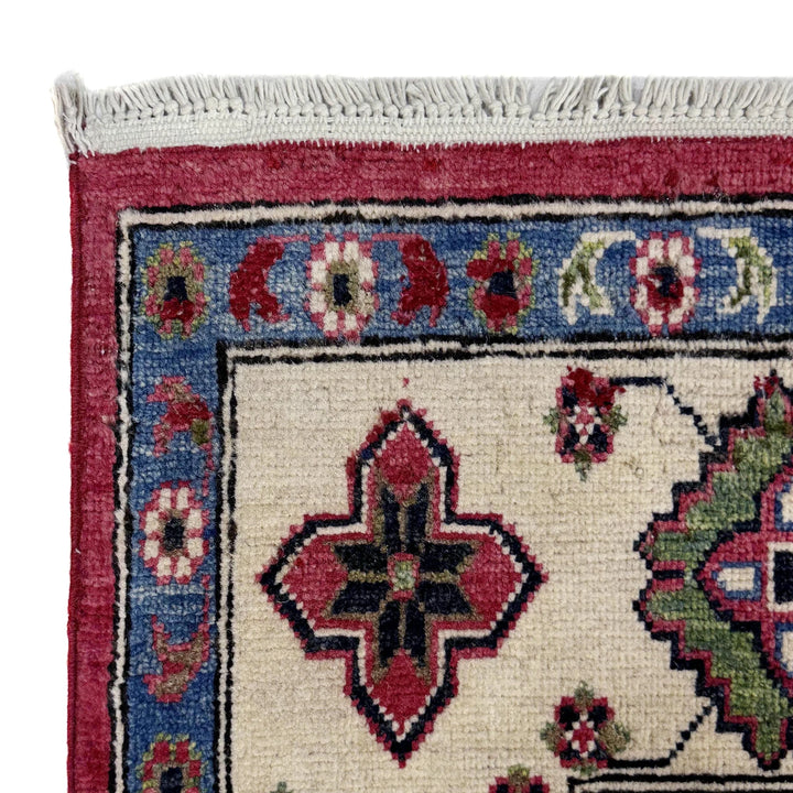 Red Afghan Kazak Rug 6' 7" x 9' 10" Hand-Knotted | No. AL48172