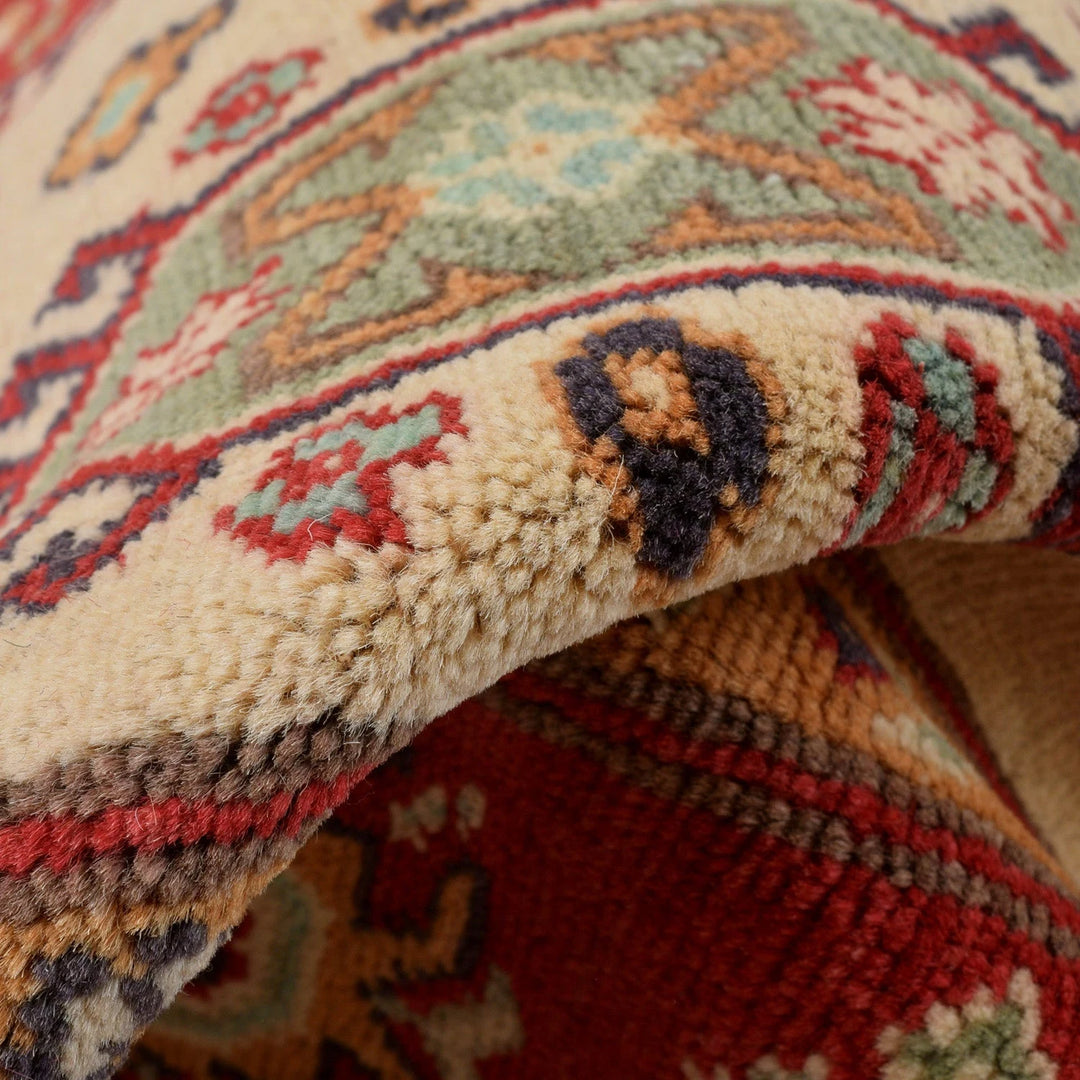 Ivory Afghan Kazak Rug 4' 11" x 6' 6" Hand-Knotted | No. AL56610
