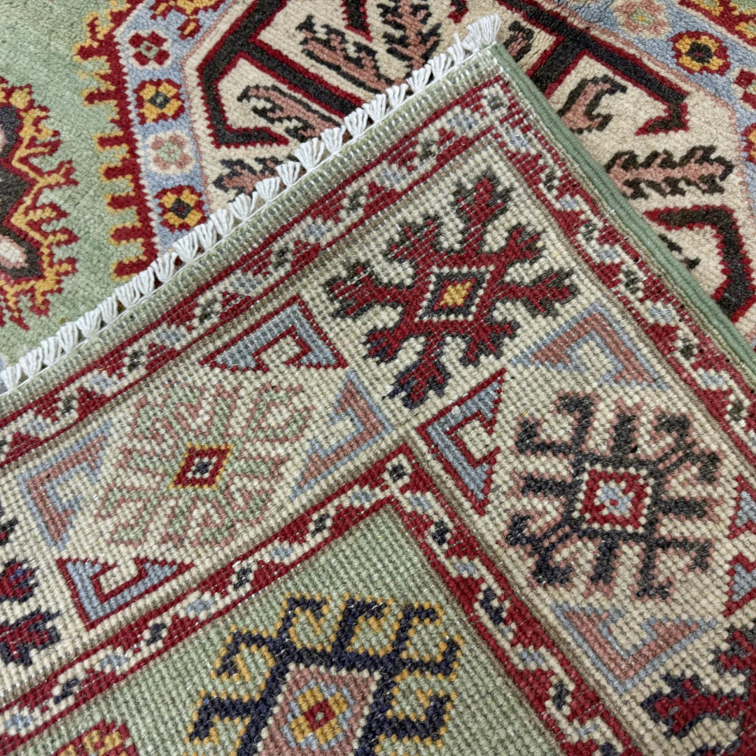Green Afghan Kazak Rug 3' 6" x 4' 9" Hand-Knotted | No. AL56933