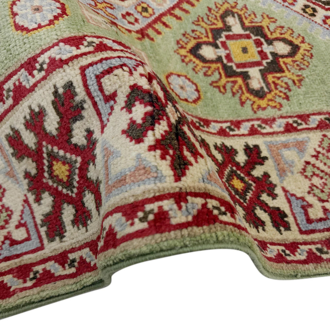 Green Afghan Kazak Rug 3' 6" x 4' 9" Hand-Knotted | No. AL56933