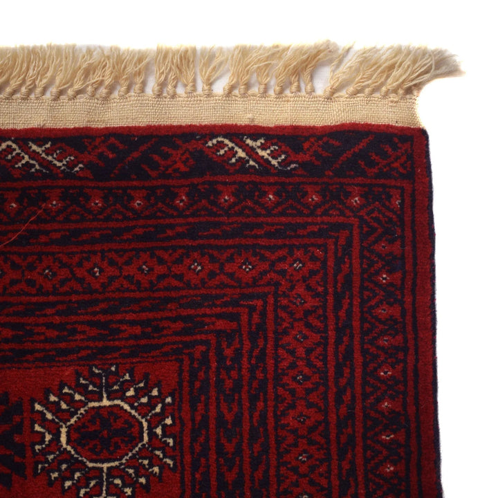 Red Afghan Bokhara Rug 6' 9" x 9' 7" Hand-Knotted | No. AL58569