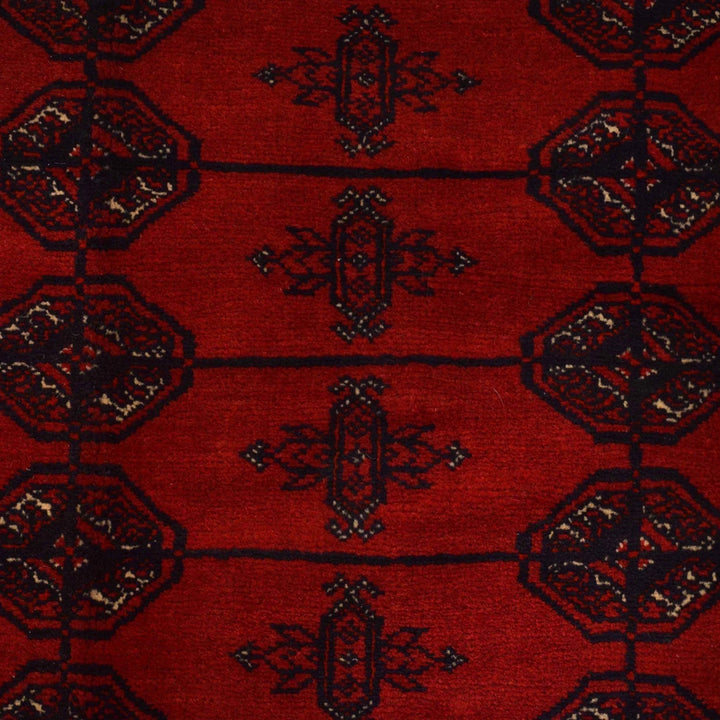 Red Afghan Bokhara Rug 6' 9" x 9' 7" Hand-Knotted | No. AL58569