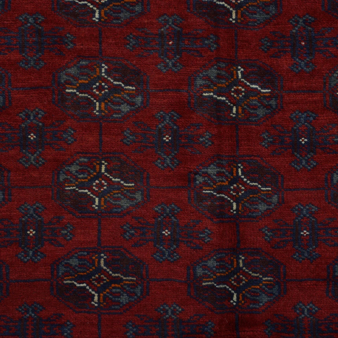 Red Afghan Baluchi Rug 6' 6" x 9' 1" Hand-Knotted | No. AL65947