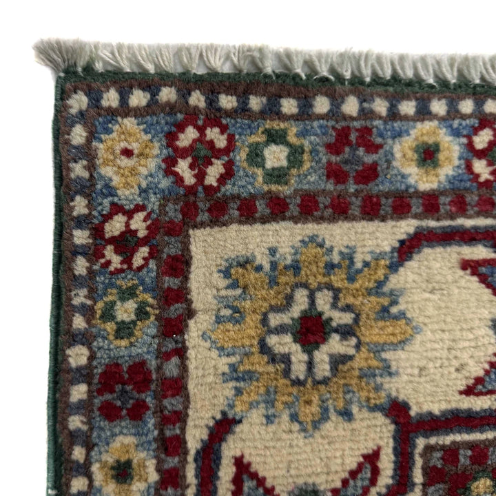 Green Afghan Kazak Rug 3' 3" x 5' 0" Hand-Knotted | No. AL68109
