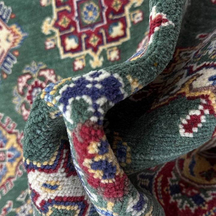 Green Afghan Kazak Rug 5' 5" x 8' 0" Hand-Knotted | No. AL77598