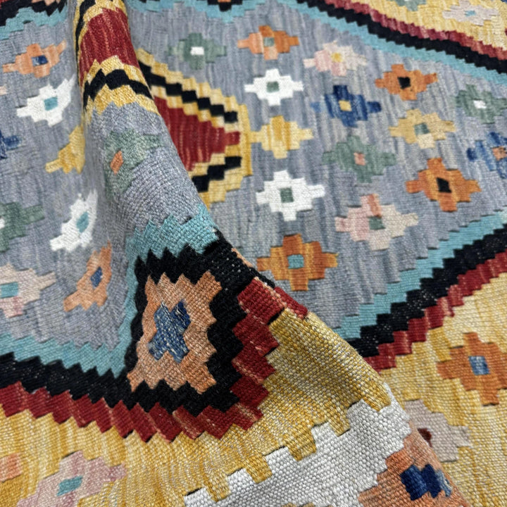 Multicolor Afghan Kilim Rug 3'6" x 4'9" Flat-Weave texture