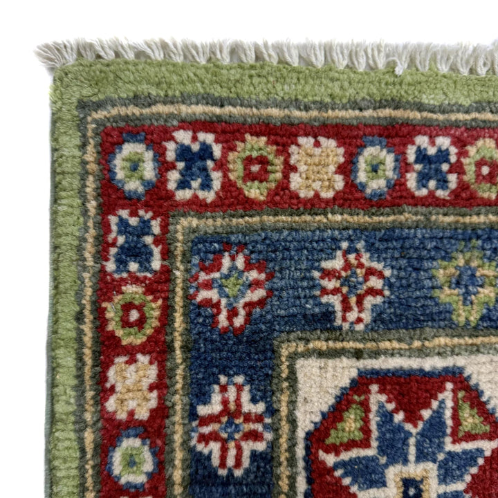 Green Afghan Kazak Rug 5' 7" x 8' 0" Hand-Knotted | No. AL84325