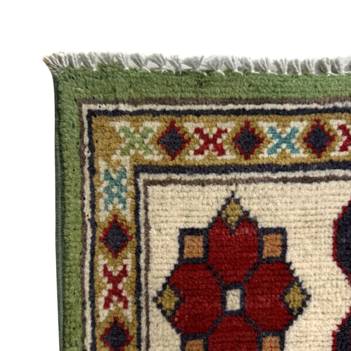 Green Afghan Kazak Rug 4' 11" x 6' 4" Hand-Knotted | No. AL84629