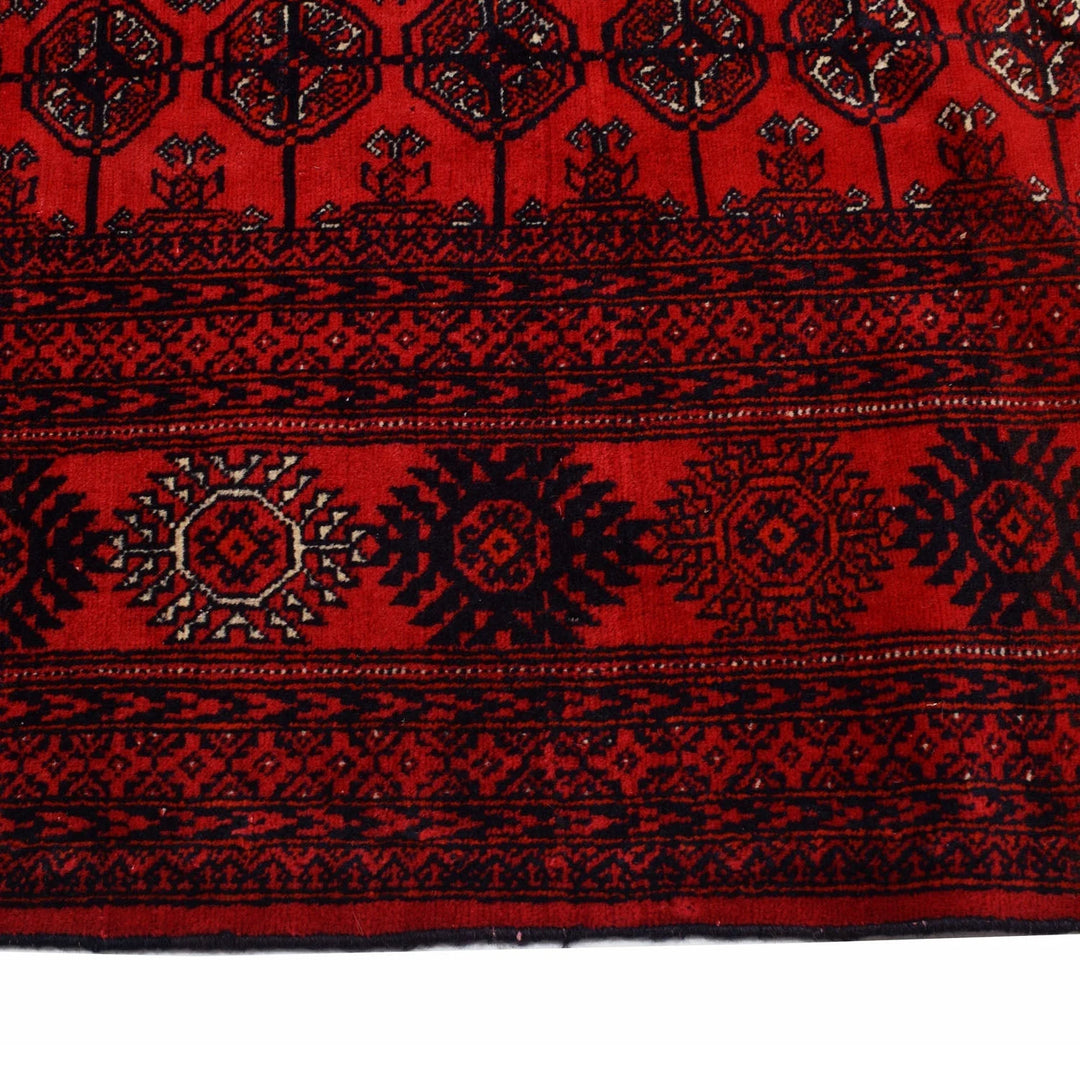 Red Afghan Bokhara Rug 6' 4" x 9' 7" Hand-Knotted | No. AL88462