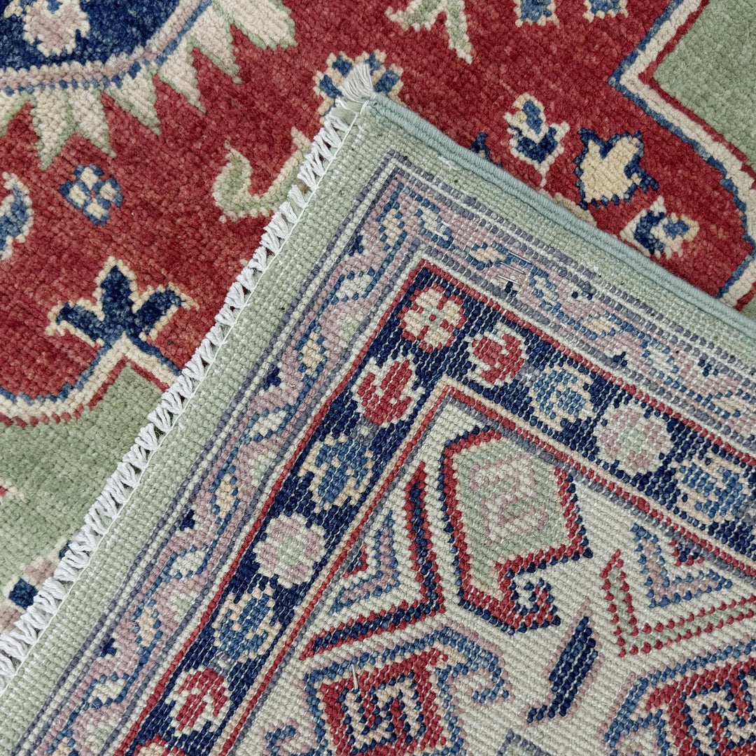 Green Afghan Kazak Rug 5' 8" x 8' 1" Hand-Knotted | No. AL93326