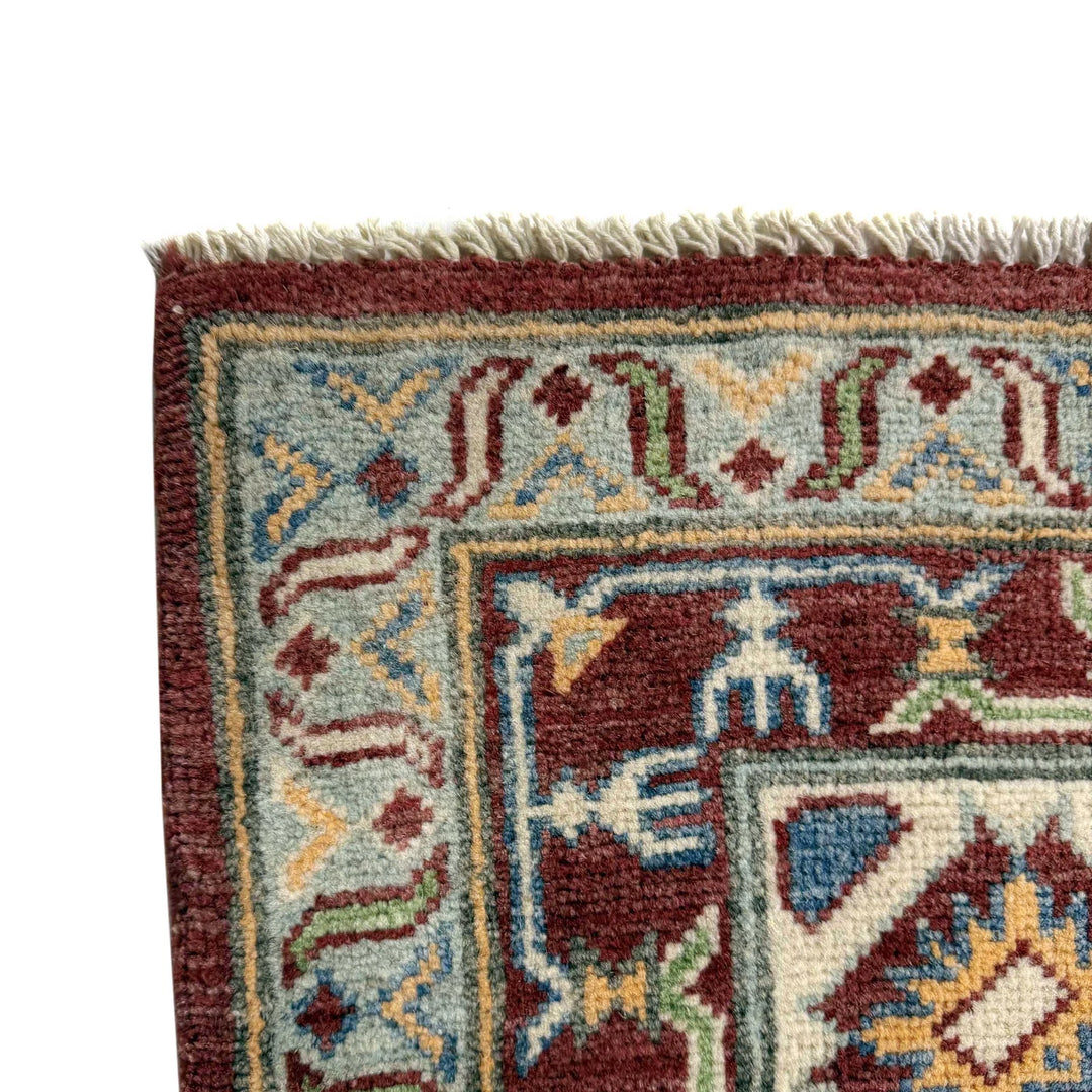 Red Afghan Kazak Rug 6' 7" x 9' 11" Hand-Knotted | No. AL97447