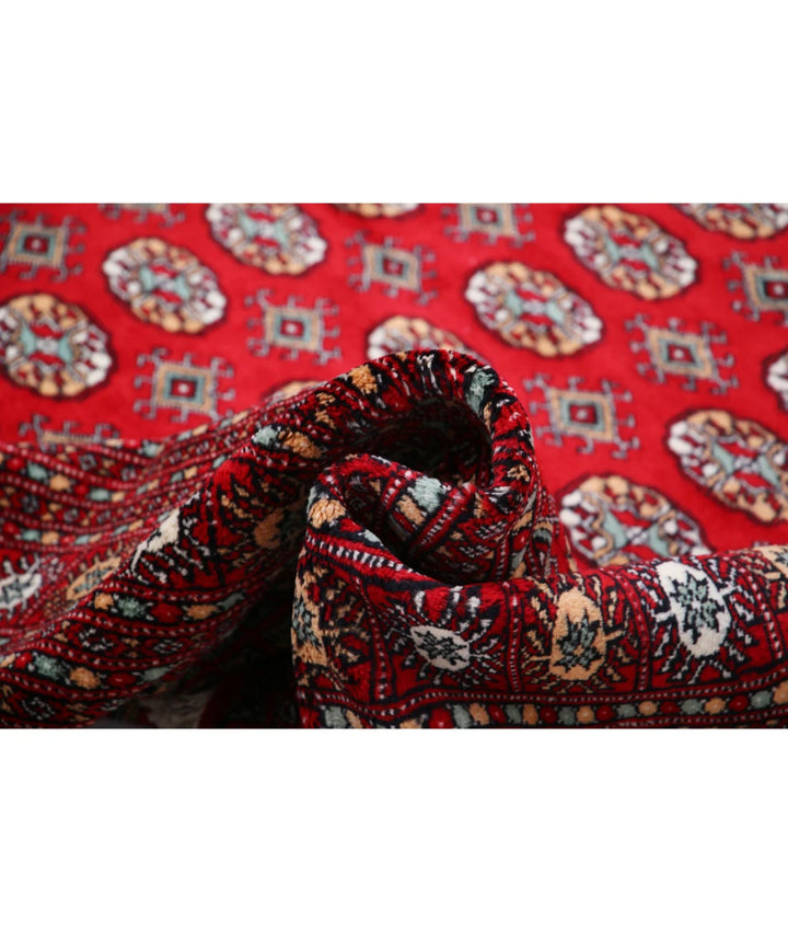 Red Pakistani Bokhara Rug 10' 2" x 13' 5" Hand-Knotted | No. AT12293
