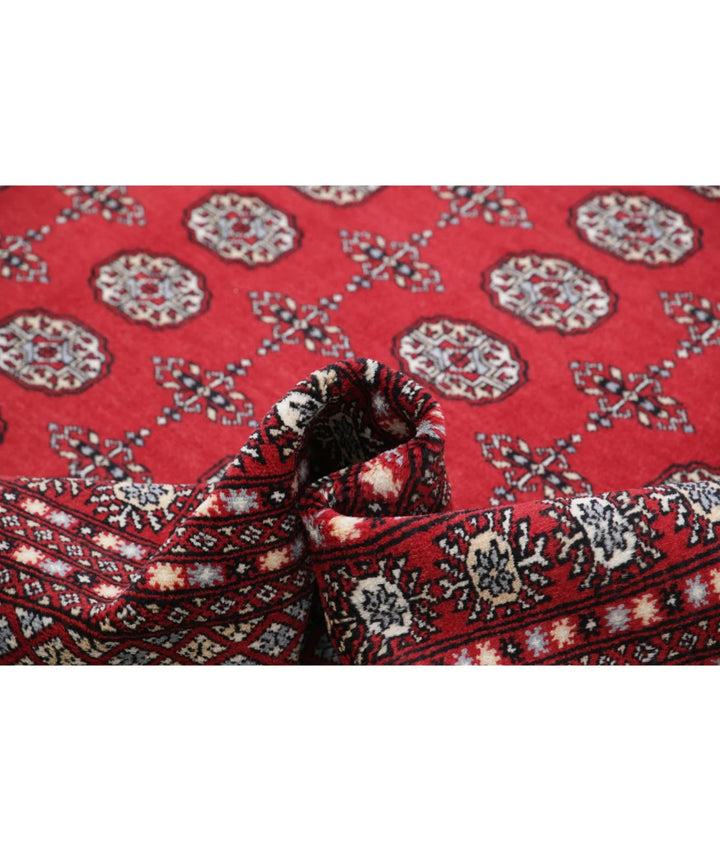 Red Pakistani Bokhara Rug 8' 0" x 10' 1" Hand-Knotted | No. AT16670