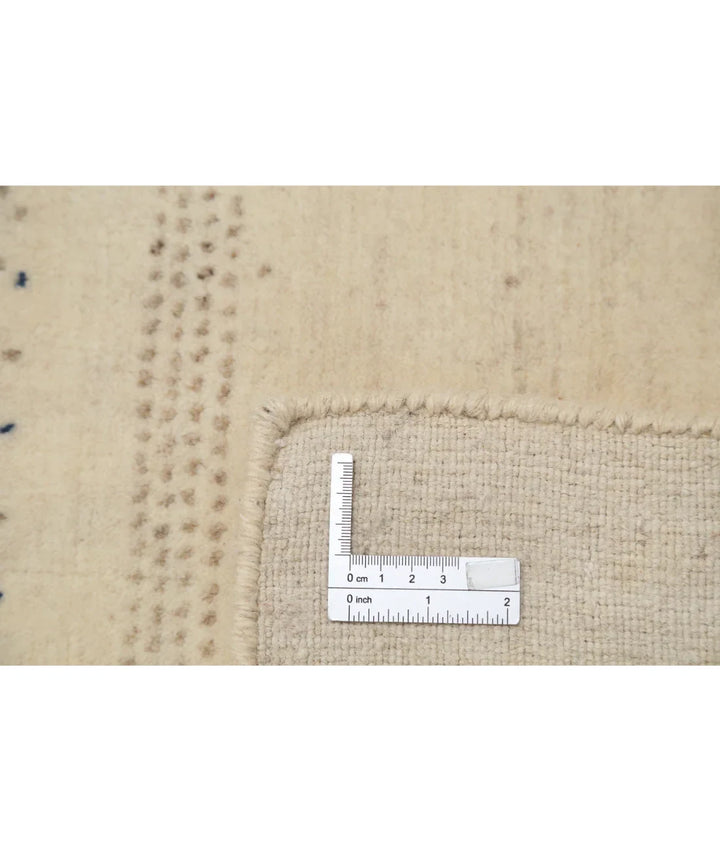 Ivory Indian Oriental Rug 5' 4" x 7' 11" Hand-Knotted | No. AT236175