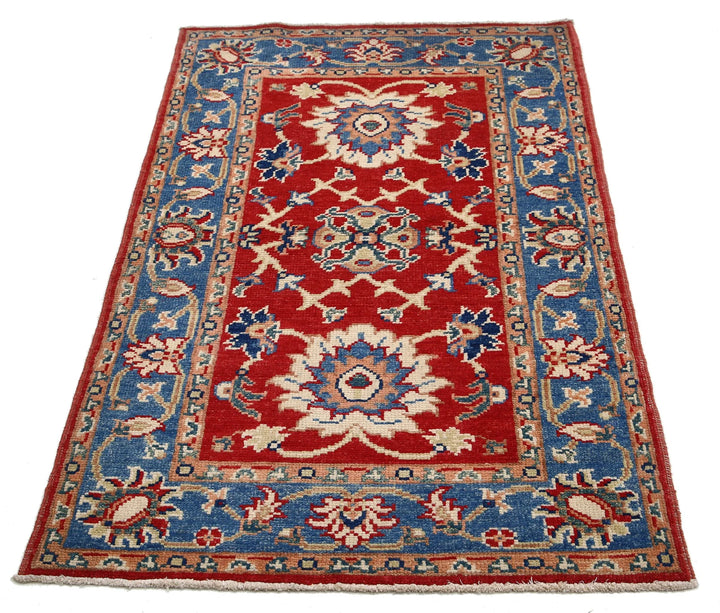 Red Afghan Oriental Rug 4'1" x 6'0" Hand-Knotted texture