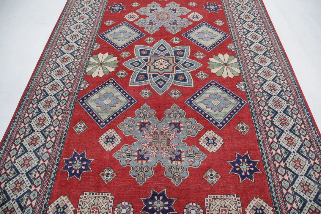 Afghan Kazak Rug 6' 8" x 9' 10" Hand-Knotted | No. AT27202
