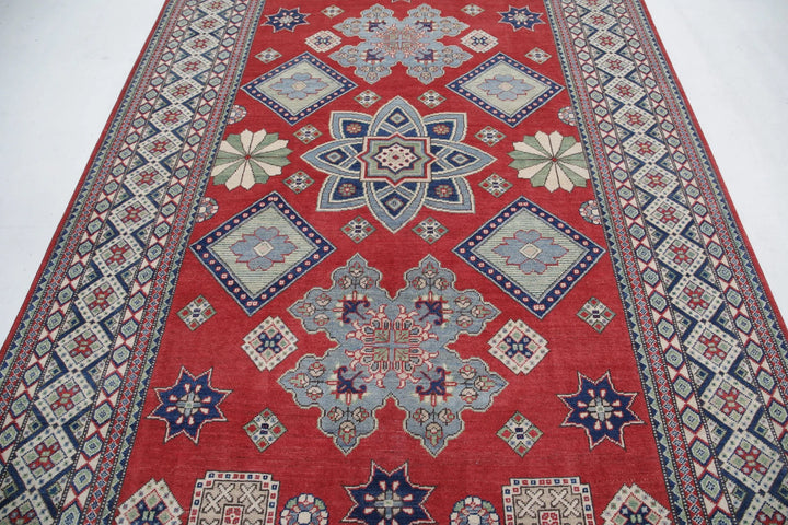 Afghan Kazak Rug 6' 8" x 9' 10" Hand-Knotted | No. AT27202