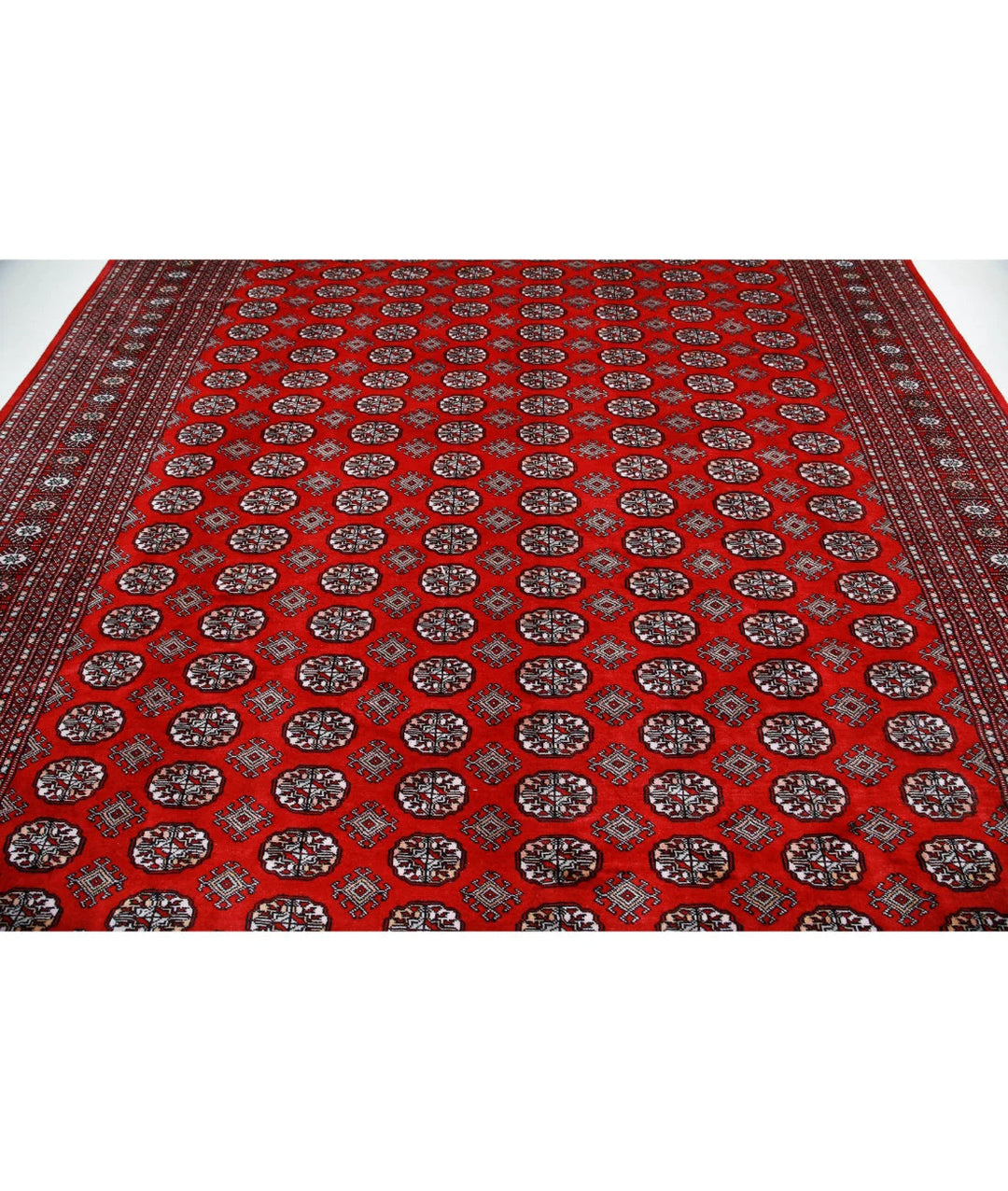 Pakistani Bokhara Rug 9' 11" x 13' 8" Hand-Knotted | No. AT28037