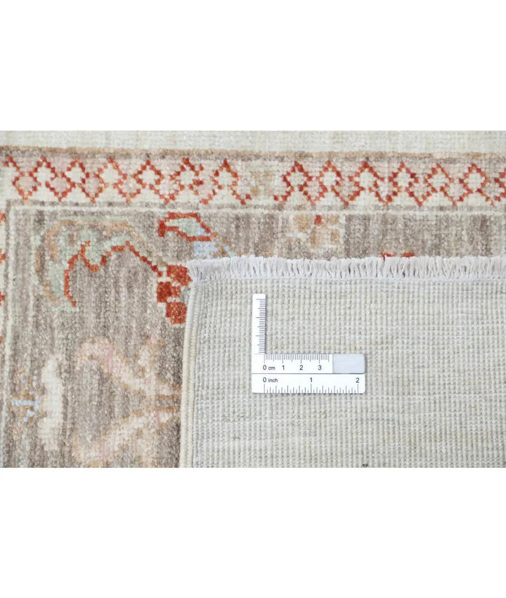 Ivory Afghan Bakhtiari Rug 4' 9" x 6' 4" Hand-Knotted | No. AT34424