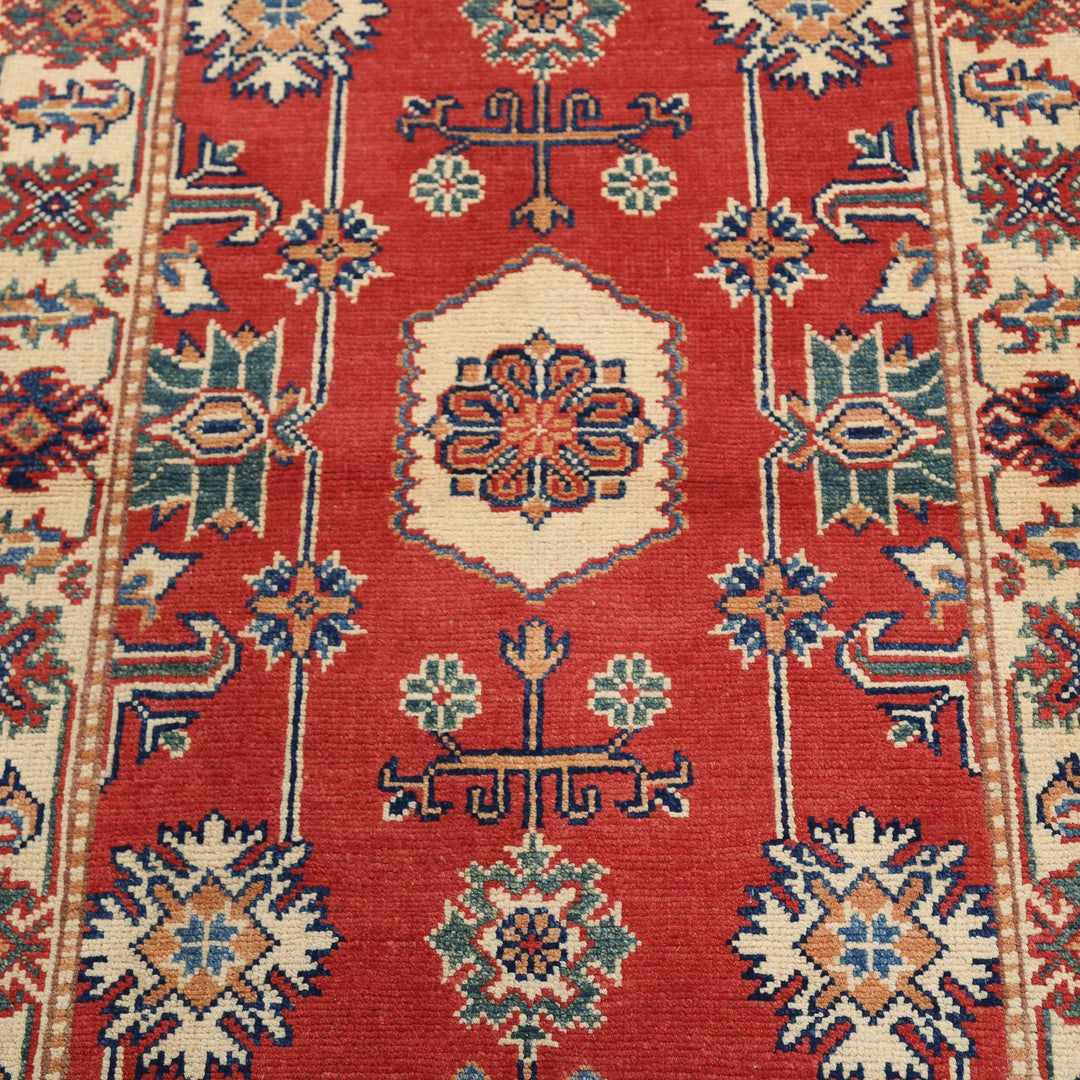 Red Afghan Oriental Rug 3' 0" x 5' 1" Hand-Knotted close-up