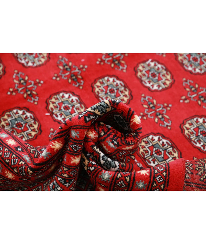 Pakistani Bokhara Rug 8' 1" x 10' 1" Hand-Knotted | No. AT38643