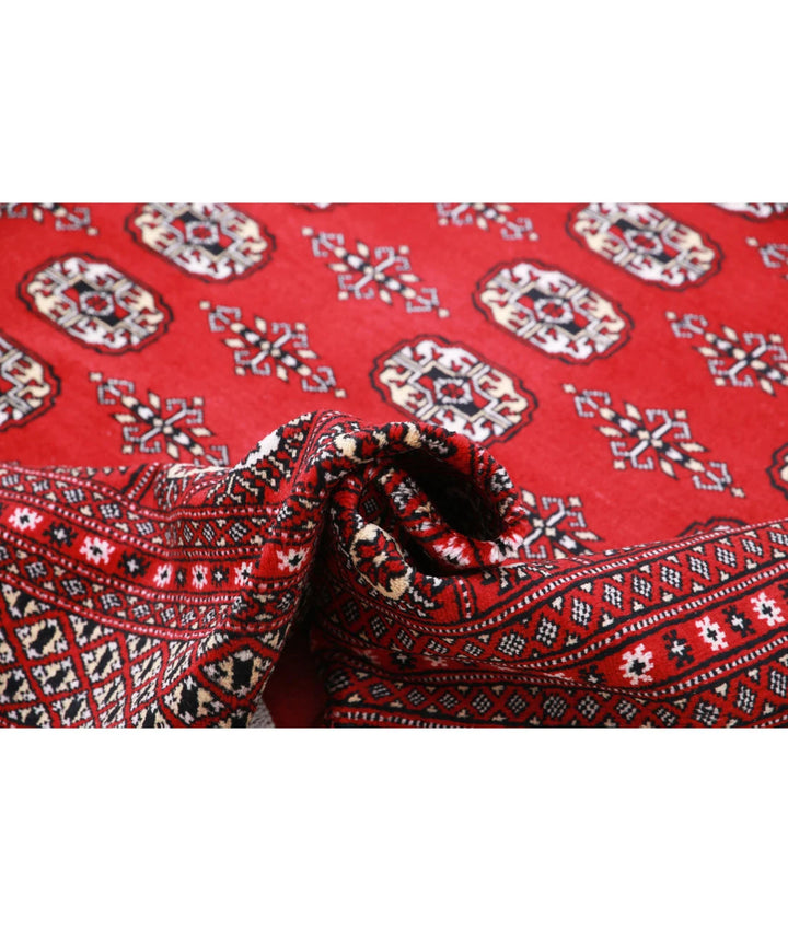Red Pakistani Bokhara Rug 8' 2" x 10' 0" Hand-Knotted | No. AT39208
