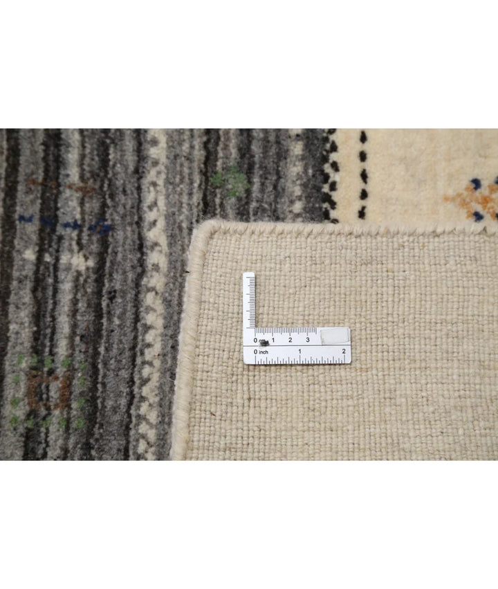 Ivory Indian Lori Rug 6' 6" x 9' 10" Hand-Knotted | No. AT46123