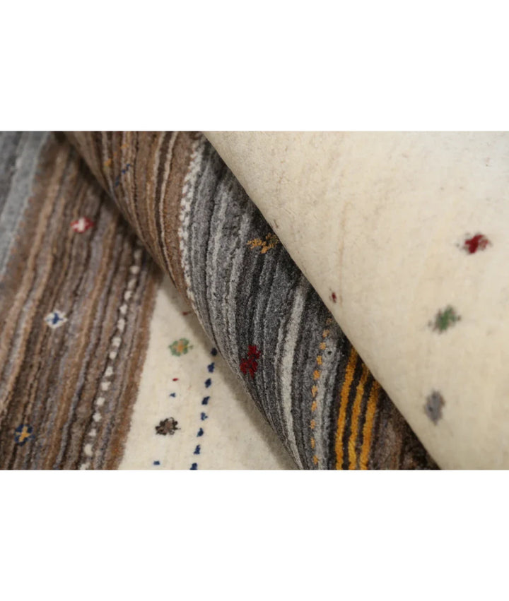 Ivory Indian Lori Rug 6' 6" x 9' 10" Hand-Knotted | No. AT46123