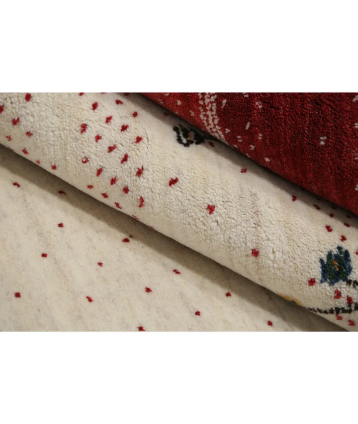 Ivory Indian Lori Rug 5' 4" x 7' 8" Hand-Knotted | No. AT541813