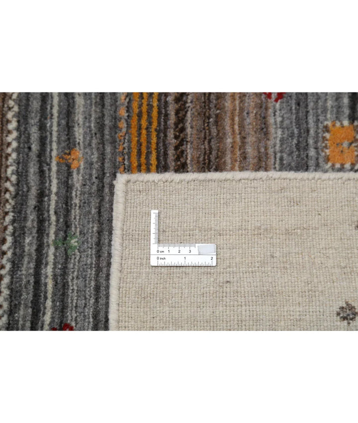 Ivory Indian Lori Rug 5' 7" x 7' 10" Hand-Knotted | No. AT57057