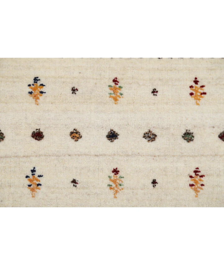 Ivory Indian Lori Rug 5' 7" x 7' 10" Hand-Knotted | No. AT57057