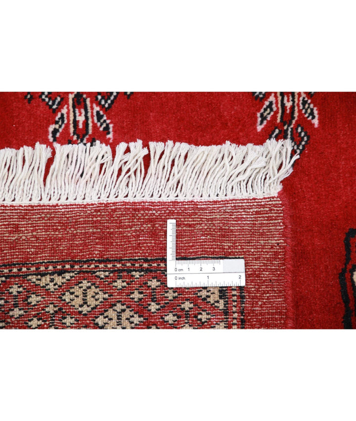 Red Pakistani Bokhara Rug 6' 1" x 8' 11" Hand-Knotted | No. AT60452