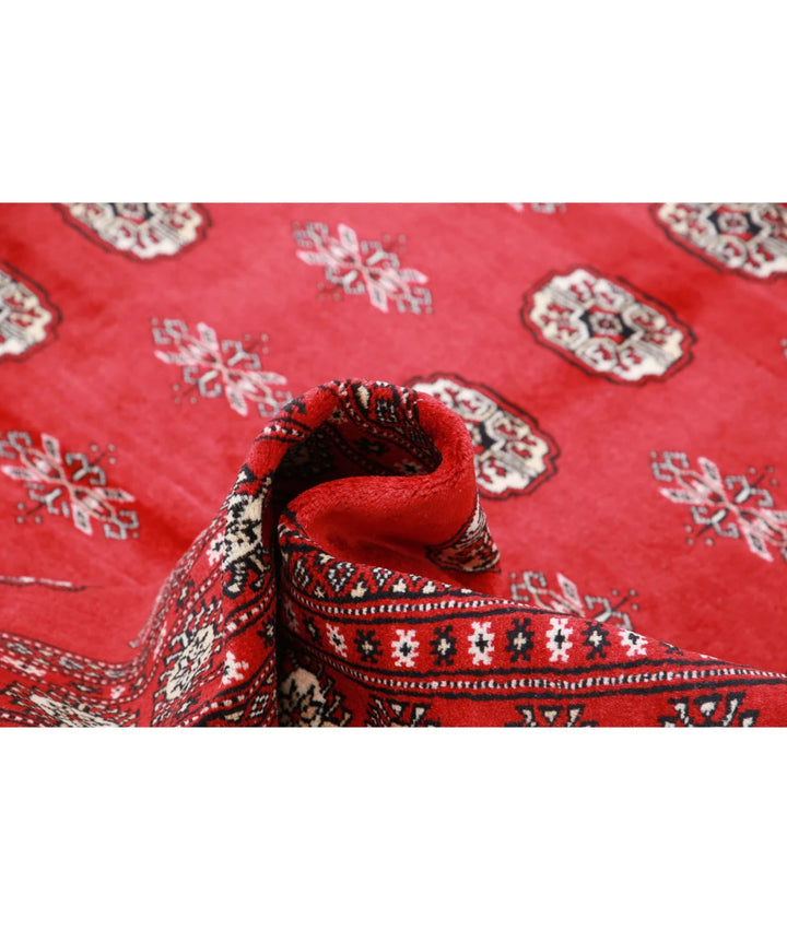 Red Pakistani Bokhara Rug 6' 1" x 8' 11" Hand-Knotted | No. AT60452