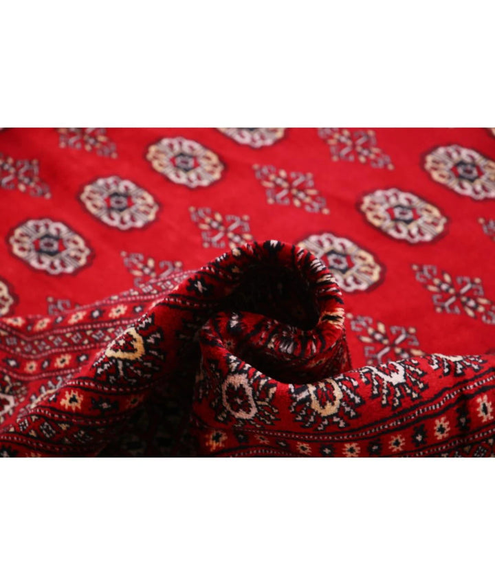 Red Pakistani Bokhara Rug 12' 2" x 17' 0" Hand-Knotted | No. AT64679