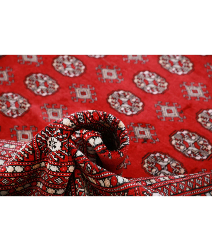 Red Pakistani Bokhara Rug 10' 2" x 13' 9" Hand-Knotted | No. AT69606