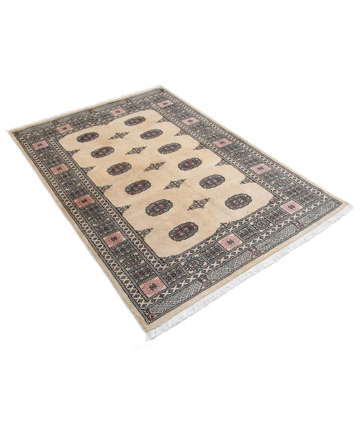 Ivory Pakistani Tribal Rug 4' 1" x 5' 10" Hand-Knotted field