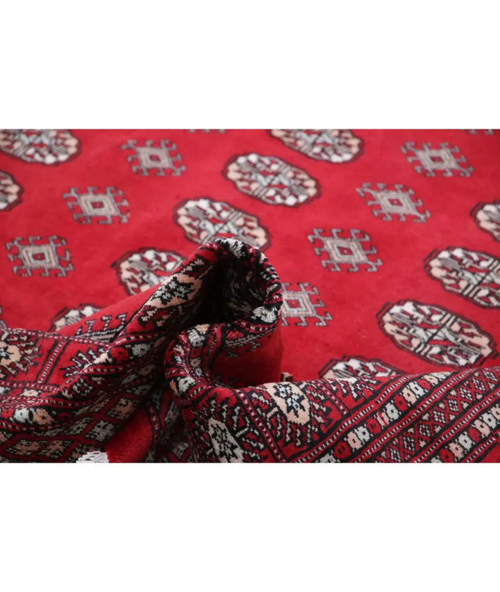 Red Pakistani Bokhara Rug 6' 0" x 8' 8" Hand-Knotted | No. AT78103