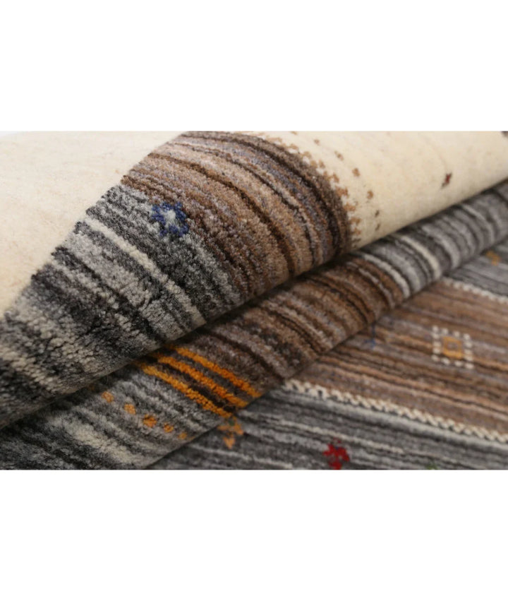 Ivory Indian Lori Rug 6' 7" x 9' 10" Hand-Knotted | No. AT78598