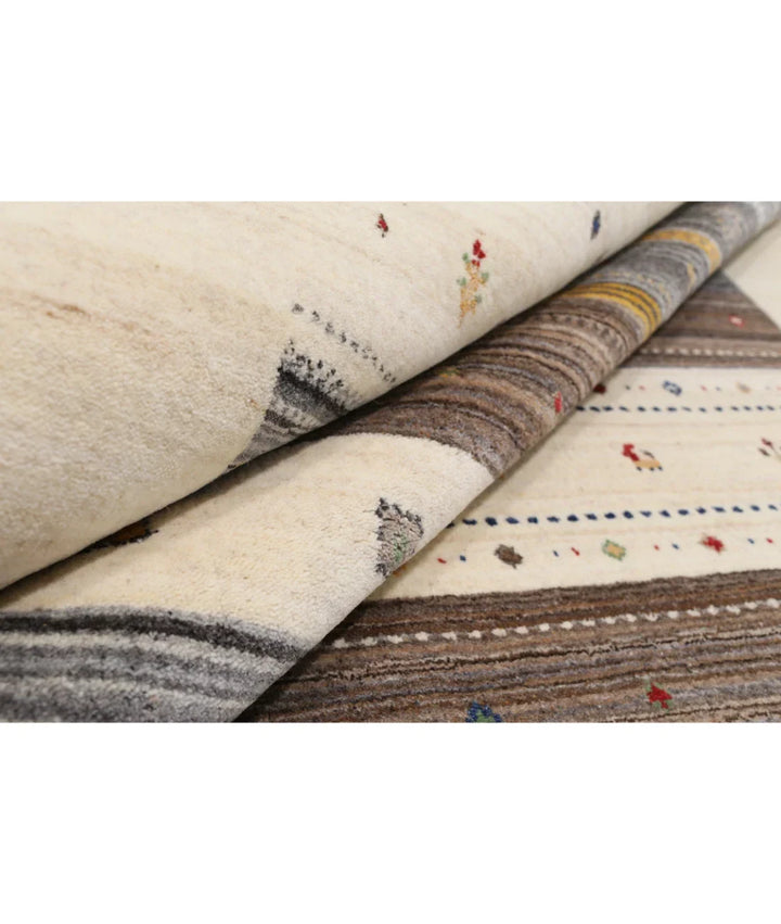 Ivory Indian Lori Rug 6' 8" x 9' 10" Hand-Knotted | No. AT80444