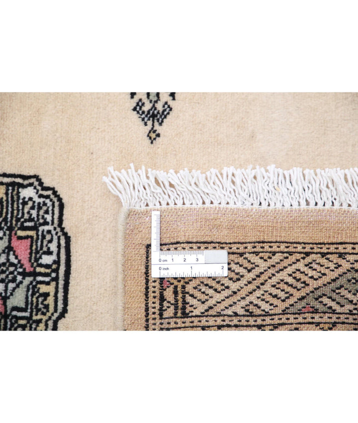 Ivory Pakistani Bokhara Rug 4' 3" x 6' 2" Hand-Knotted | No. AT85148