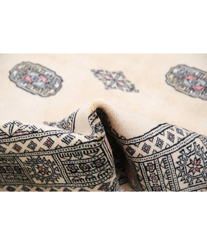 Ivory Pakistani Bokhara Rug 4' 3" x 6' 2" Hand-Knotted | No. AT85148